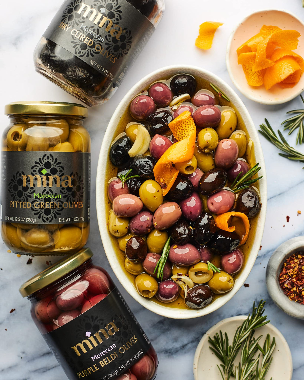 Mina olives on a plate, ideal for couscous or tagine dishes.