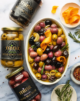 Mina olives on a plate, ideal for couscous or tagine dishes.