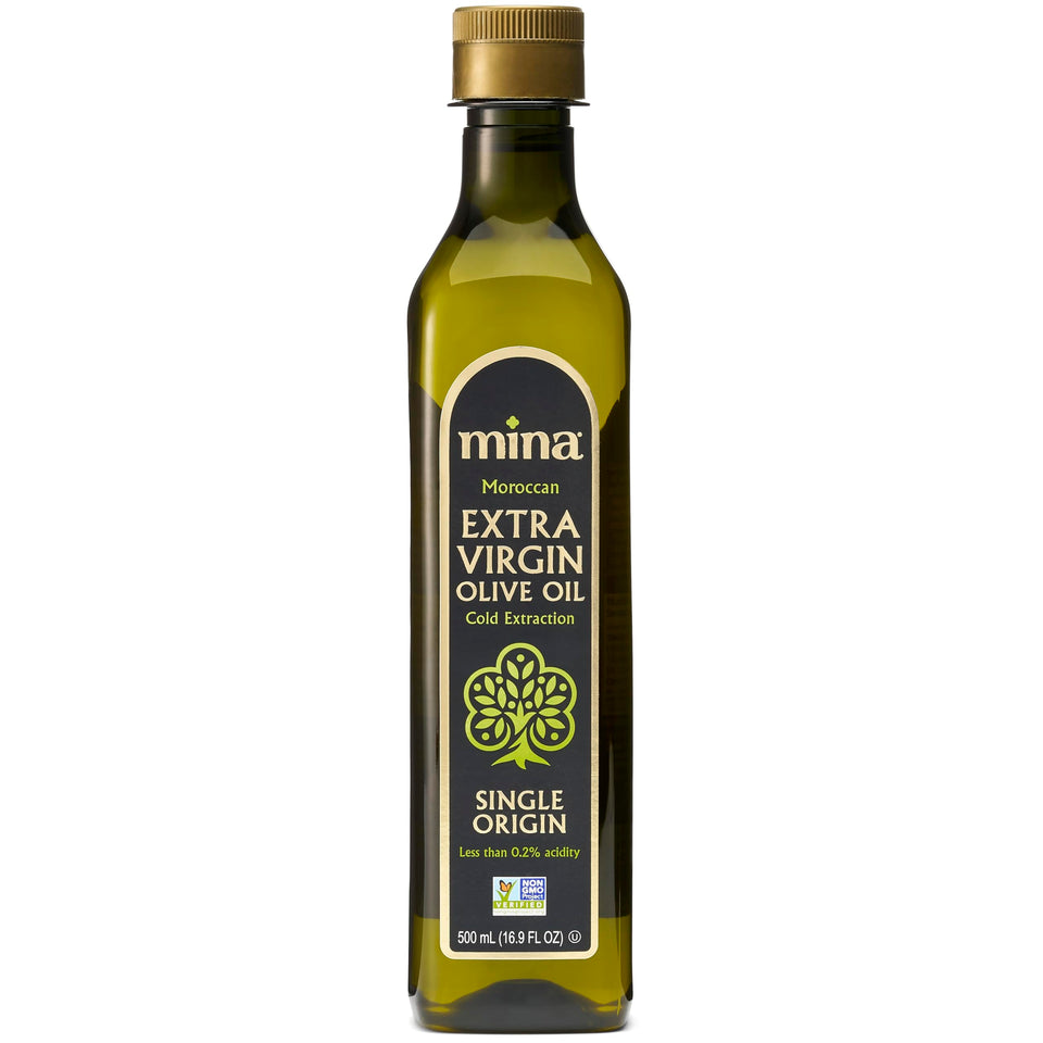 Mina Moroccan Olive Oil bottle on a kitchen counter, ready for drizzling.