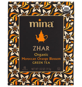 Mina orange blossom green tea steeping cup showing inviting aroma.