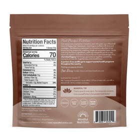 Mindful Nutrition Grandmas hot chocolate bar setup with pods and add-ins.