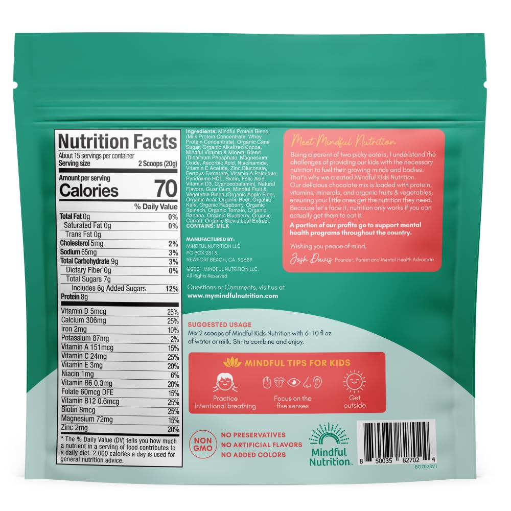 Mindful Nutrition chocolate mix in glass illustrating creamy chocolate milk ready to enjoy.