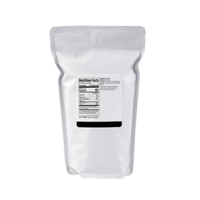 Pouring Minimalist Gelatin Powder to create smooth, professional-textured desserts.