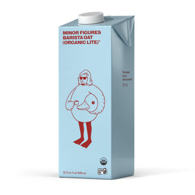 Minor Figures Organic Light Oat Milk bottle, 32 oz, smooth texture ideal for coffee.