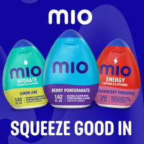 Glass of water with Mio Berry Pomegranate shows vibrant color.
