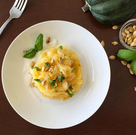 Miracle Noodle fettuccine in a bowl with sauce showing versatility