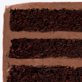Miss Jones Baking decorated cake with frosting, glossy finish enhances celebration desserts.