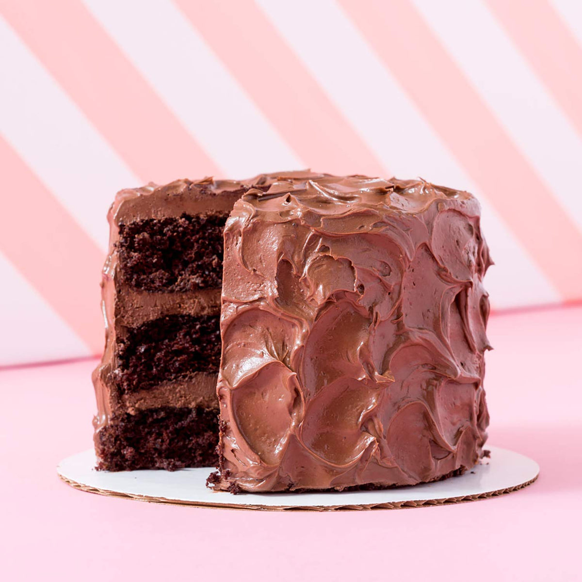 Miss Jones Baking organic buttercream frosting piping close-up, silky texture for professional-looking edges.