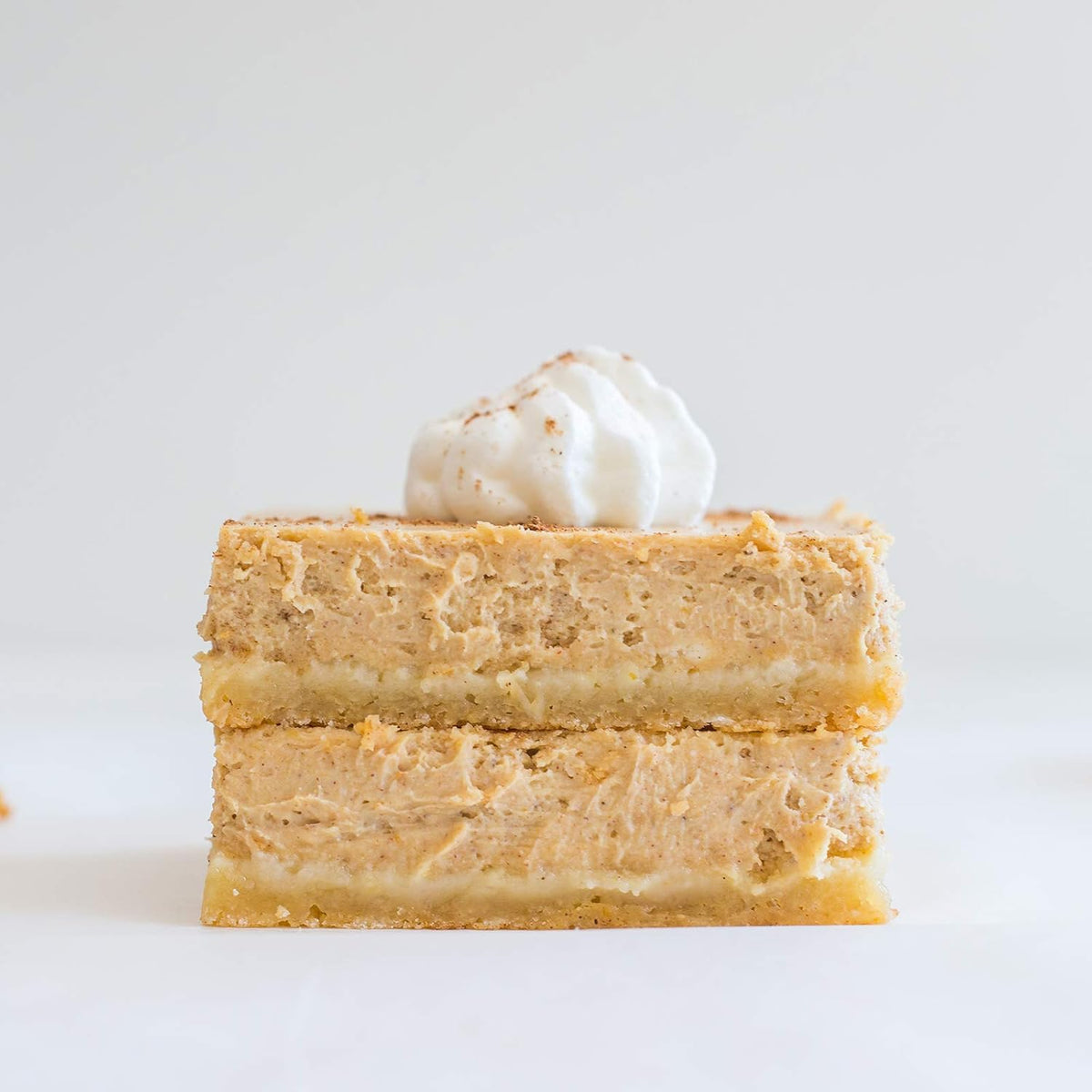 Miss Jones Baking Organic Vanilla Buttercream Frosting pack-3 close-up shows creamy texture.