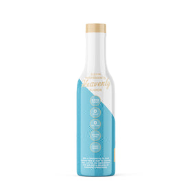 Pouring Miss Mary's Sinless Syrup to sweeten a keto-friendly drink.