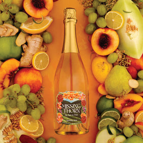 Missing Thorn Sparkling White NA Riesling paired with soft cheeses for a tasting night.