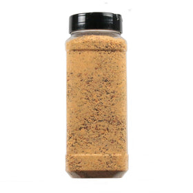 Misty's Steakhouse seasoning pour close-up, aromatic blend enhances meat dishes.