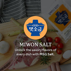 Chung Jung One Miwon MSG Salt Seasoning pours smoothly into a spoon for quick flavor boosts.