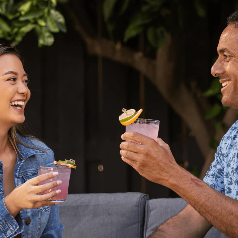 Mixxers Paloma aroma and color rise in a chilled glass.