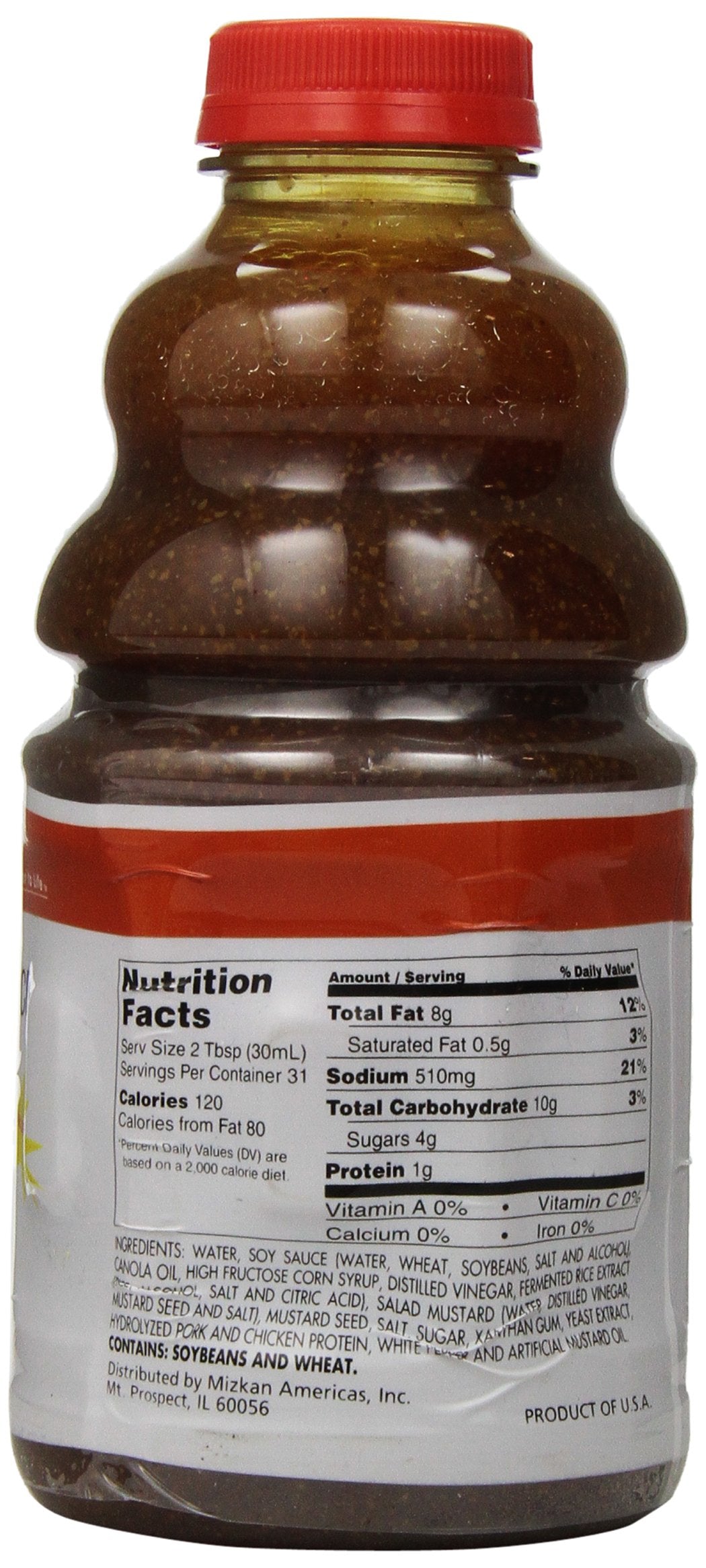 Mizkan Mustard Dressing bottle pour over greens for tangy flavor.