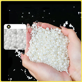 Mkostlich white pearl sprinkles top cupcakes for charming, professional-looking desserts.