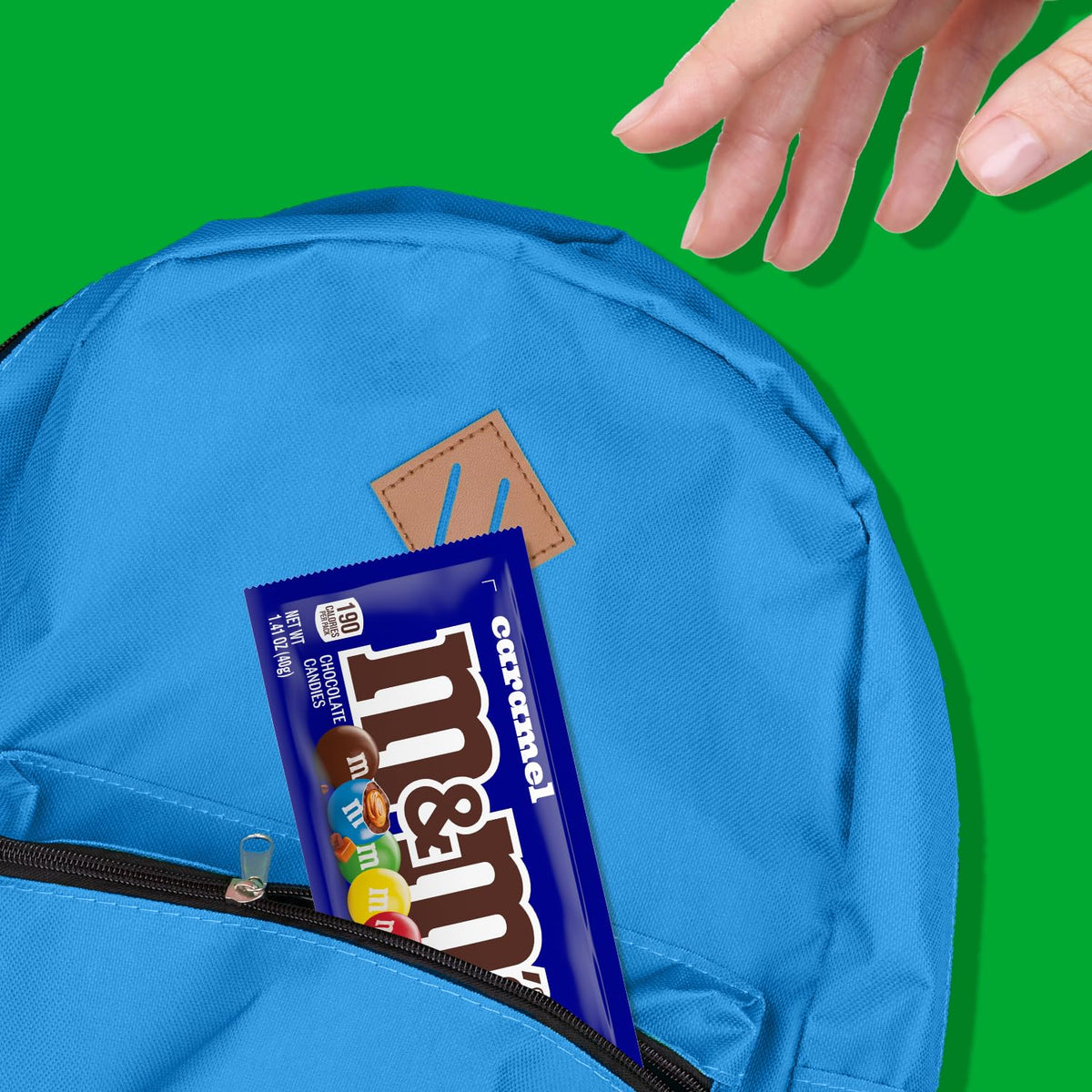M&M'S caramel chocolates arranged in a 24-pack for convenient sharing.