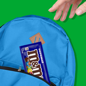 M&M'S caramel chocolates arranged in a 24-pack for convenient sharing.
