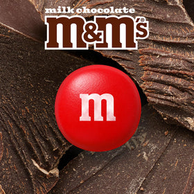 Close-up of M&M'S at a candy buffet display for celebrations.