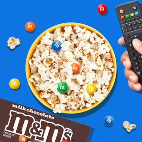 M&M'S Milk Chocolate Candies on a tray showing bite-sized, shareable snacks.