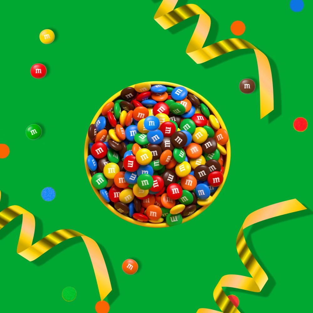 Cupcakes topped with M&M'S MINIS for festive decoration.