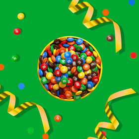Cupcakes topped with M&M'S MINIS for festive decoration.