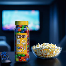 Movie night setup with M&M's ready for popcorn bowls.