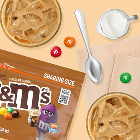 Office candy station with M&M'S Caramel Cold Brew bowls encourages sharing.