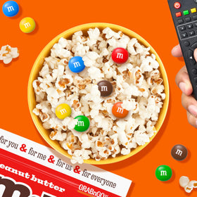 M&M's sealed bag close-up shows colorful shells and creamy centers.