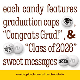 Cake topper and decor accents featuring M&M’S World graduation prints.