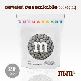 M&M'S WORLD graduation party display with silver candies for celebratory snacking