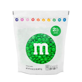 M&M’S WORLD green milk chocolate candies in a resealable bulk pack for easy party snacking.