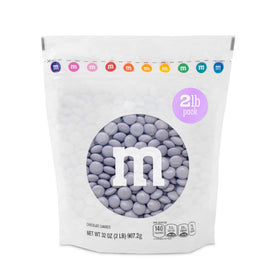 M&M'S WORLD light purple milk chocolate candy close-up for colorful snacking and decor.