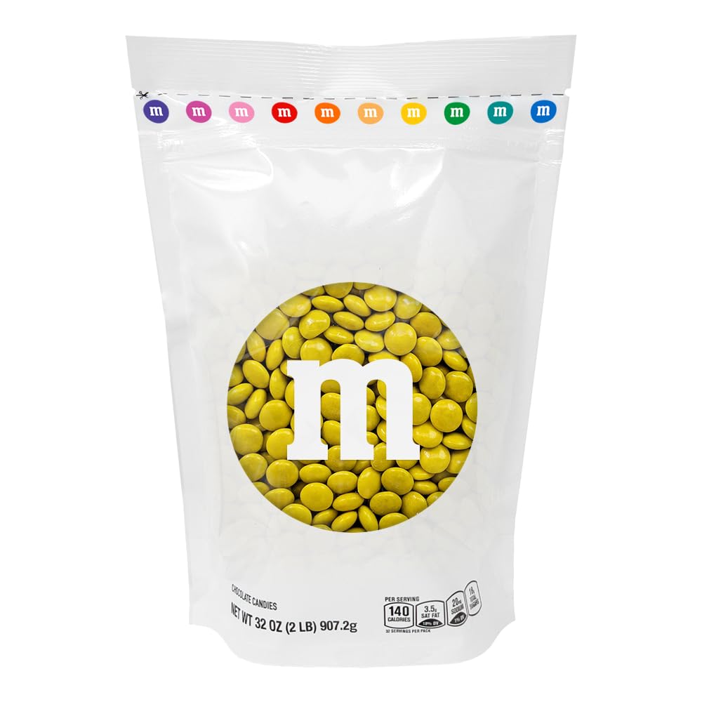 M&M'S WORLD yellow milk chocolate candies in bulk for party favors and snack bowls.