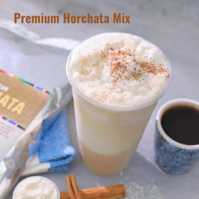 Prepared hot horchata in glass showing creamy texture and cinnamon aroma