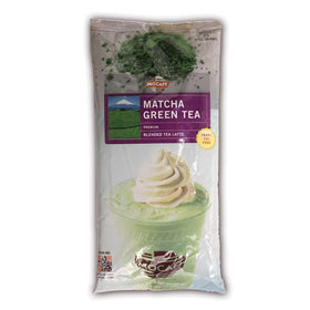 MOCAFÉ Matcha Latte in steaming cup showing vibrant green color