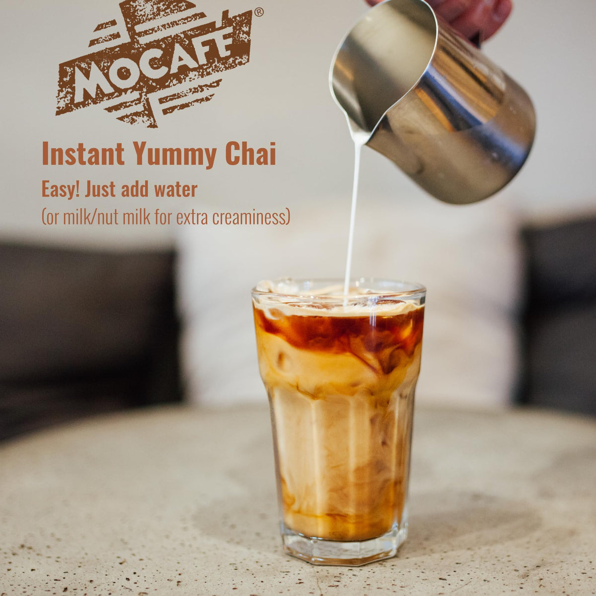 MOCAFÉ Spiced Chai Latte Powder served in a steaming cup for comforting hot chai.