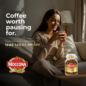 Moccona dark roast steaming cup conveys robust flavor