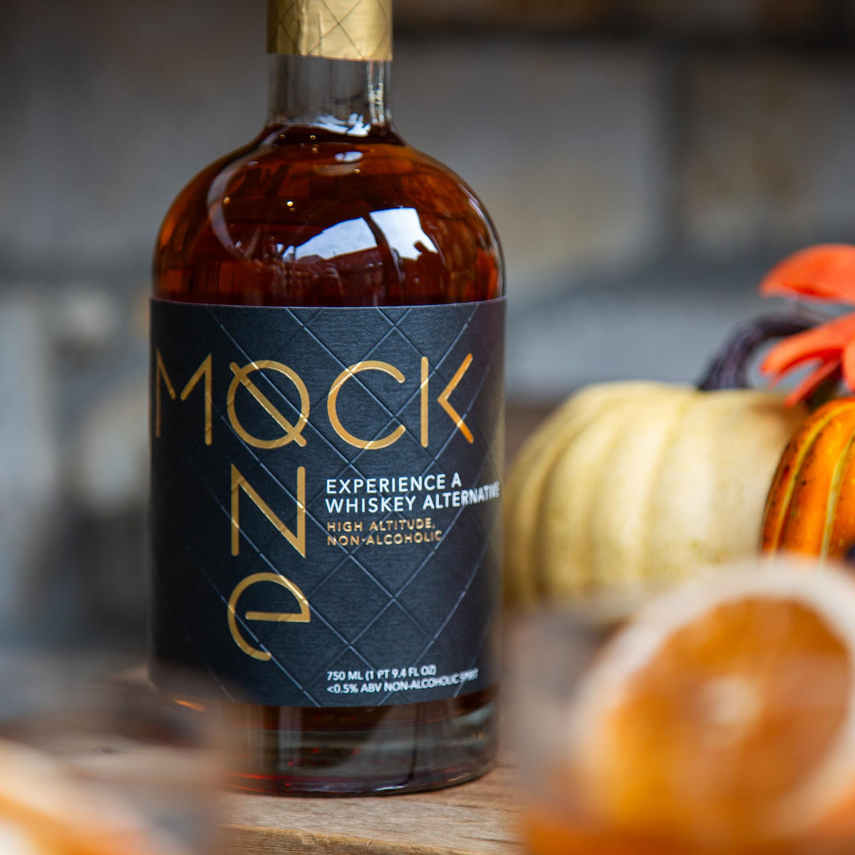 Amber-hued Mock One in a cocktail glass emphasizing oak and vanilla notes.