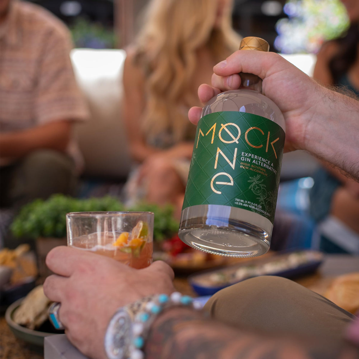 MOCK ONE garnish with lemon suggests bright, refreshing serving ideas.