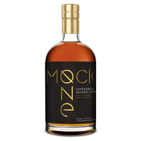Mock One Non-Alcoholic Whiskey bottle pouring for zero-proof cocktails.