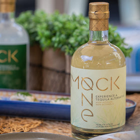 Mock One Tequila bottle on bar ready for entertaining.
