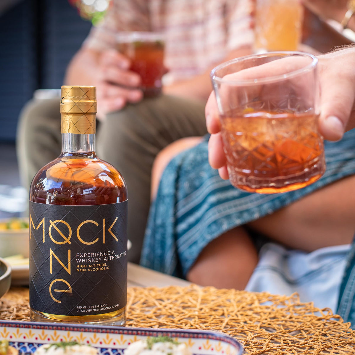 Zero-proof whiskey mocktail idea starring Mock One with citrus.