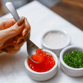 Modernist Pantry caviar spheres demo with several formed pearls