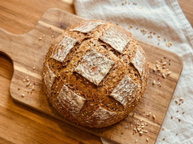 Molibake 8 Grain Bread Mix ingredients close up featuring flax millet and rye.