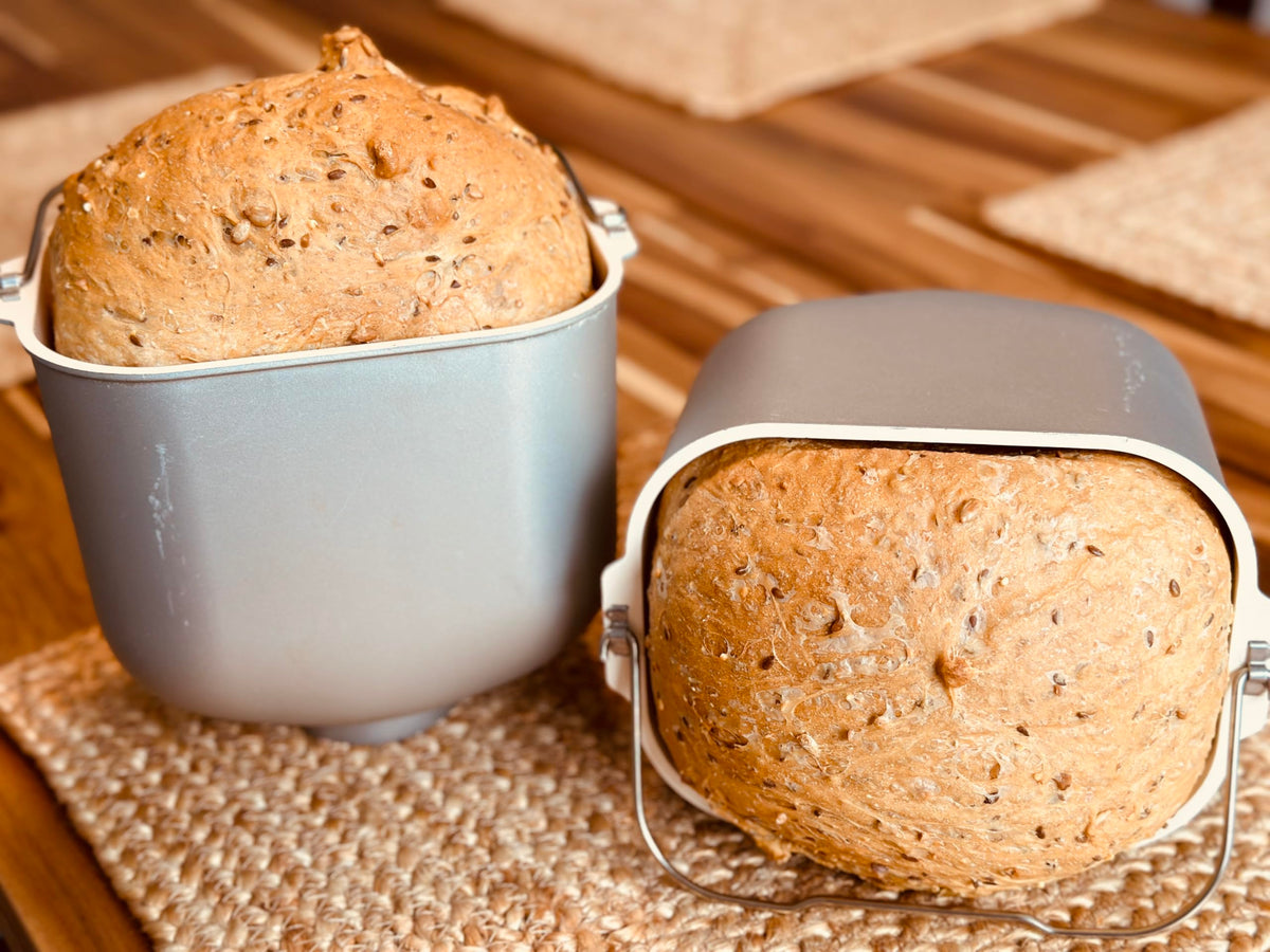 Molibake 8-grain bread mix multigrain ingredients on a counter, ready to bake in home ovens.