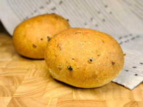 Olive oil and herbs drizzled over Molibake focaccia finish.
