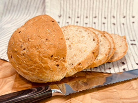 Molibake Onion Bread Mix loaf fresh from oven ready to slice.