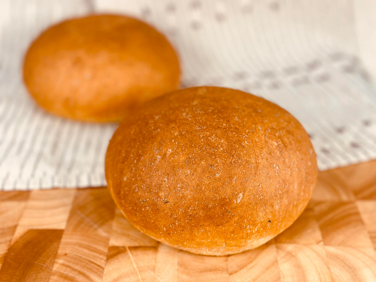 Oven-baked Molibake loaf emerges golden with a fragrant herb aroma.