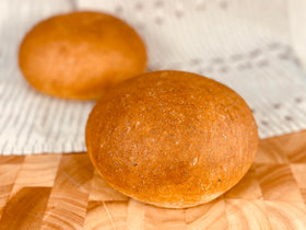 Oven-baked Molibake loaf emerges golden with a fragrant herb aroma.